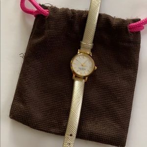 Women’s gold Kate spade watch